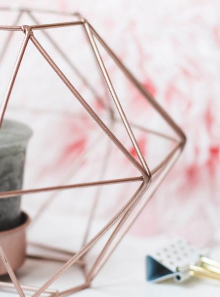selective-focus-photography-of-candle-in-pink-ornate-holder