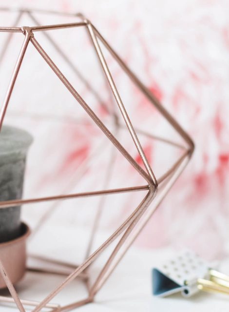 selective-focus-photography-of-candle-in-pink-ornate-holder